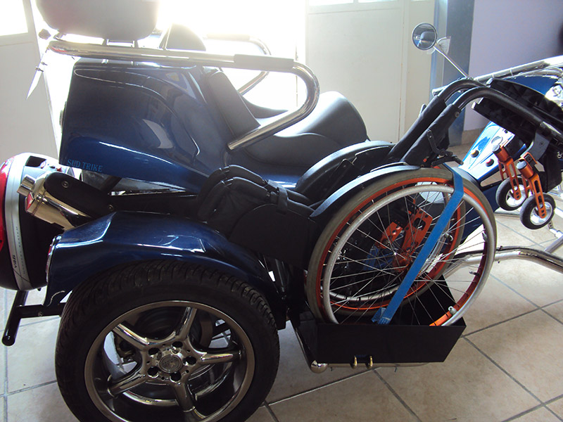 Emplacement fauteuil roulent trike